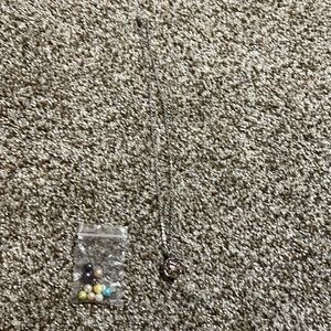 Flower pearl necklace.